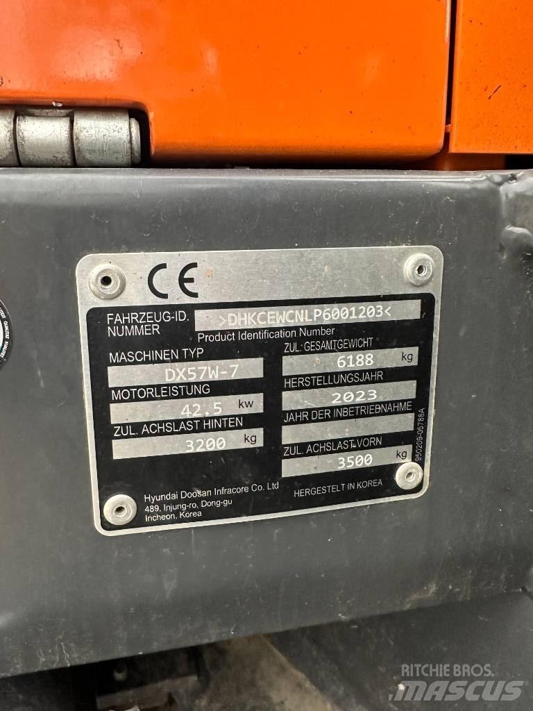 Develon DX 57 W-7 Wielgraafmachines