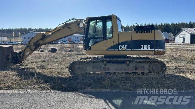 CAT 318 C Rupsgraafmachines