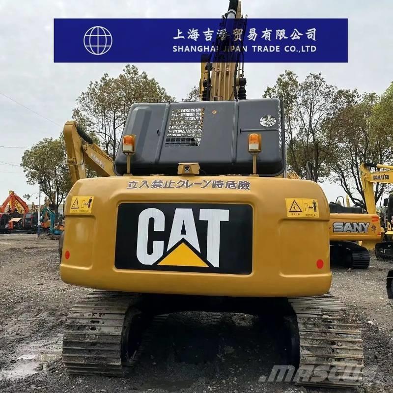 CAT 323 D Rupsgraafmachines