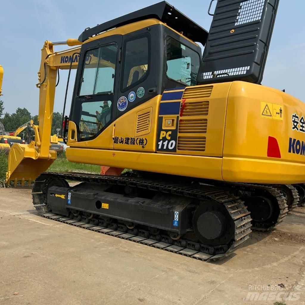 Komatsu 110 Rupsgraafmachines