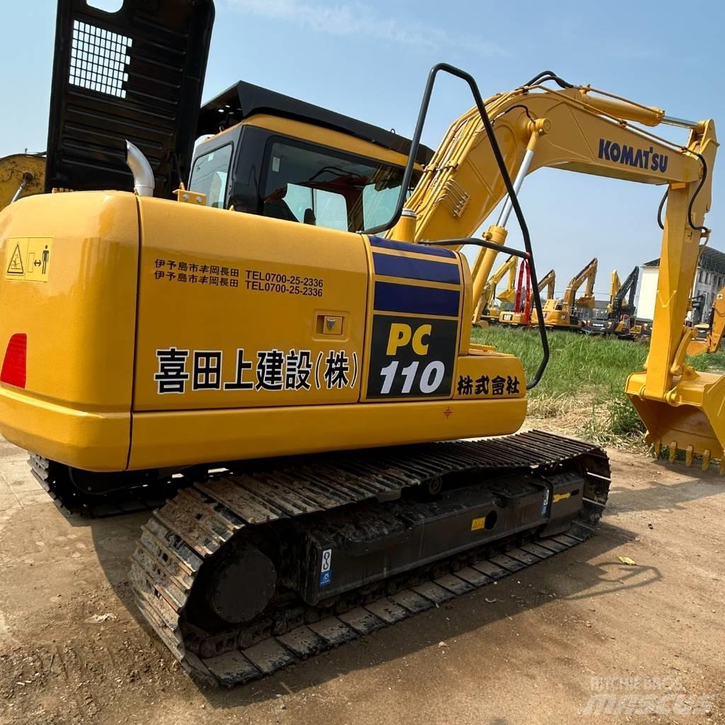 Komatsu 110 Rupsgraafmachines