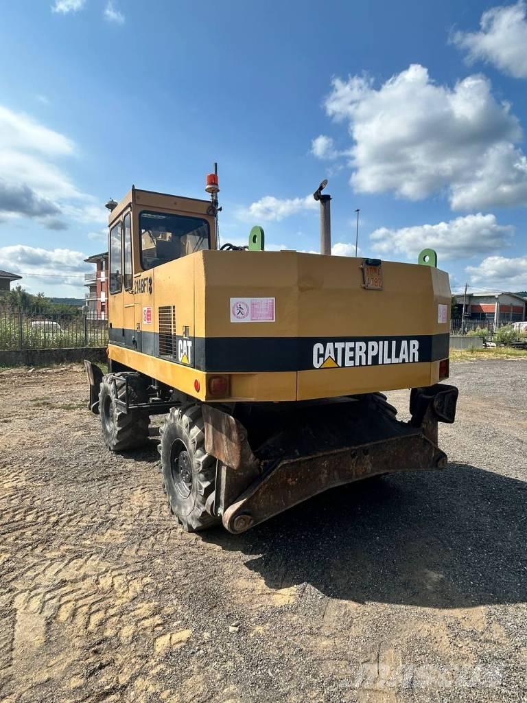 CAT 214 Wielgraafmachines