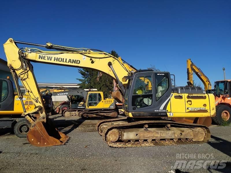 New Holland E 265 C Rupsgraafmachines