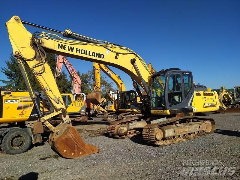 New Holland E 265 C Rupsgraafmachines
