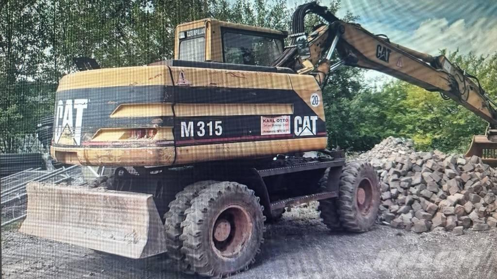 CAT M 315 Wielgraafmachines