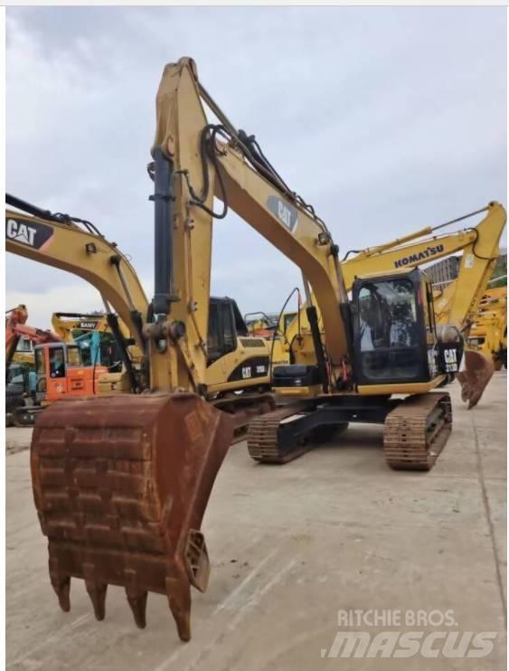 CAT 313 D Rupsgraafmachines