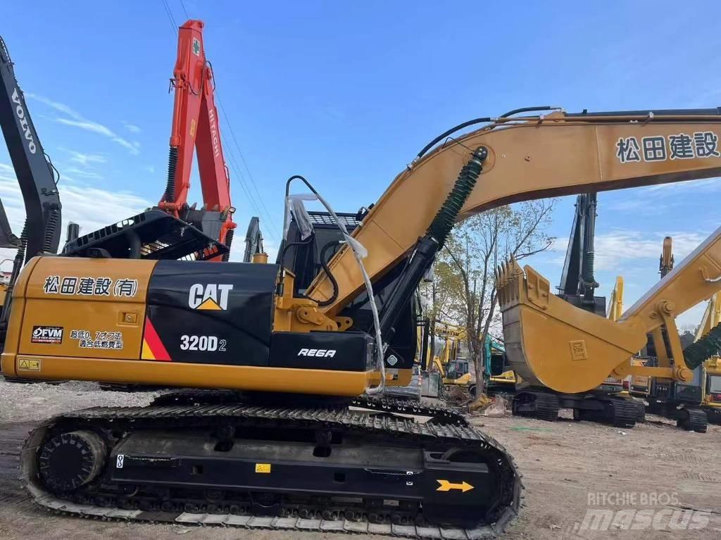 CAT 320 Rupsgraafmachines