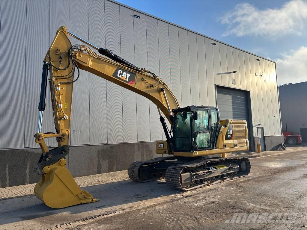 CAT 323 Rupsgraafmachines