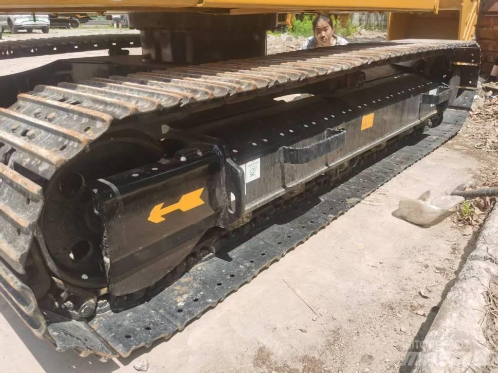 CAT 310 Rupsgraafmachines