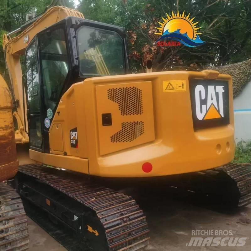 CAT 310 Rupsgraafmachines
