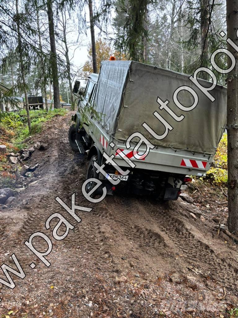 Unimog U 1250L DoKa Schuifzeilopbouw