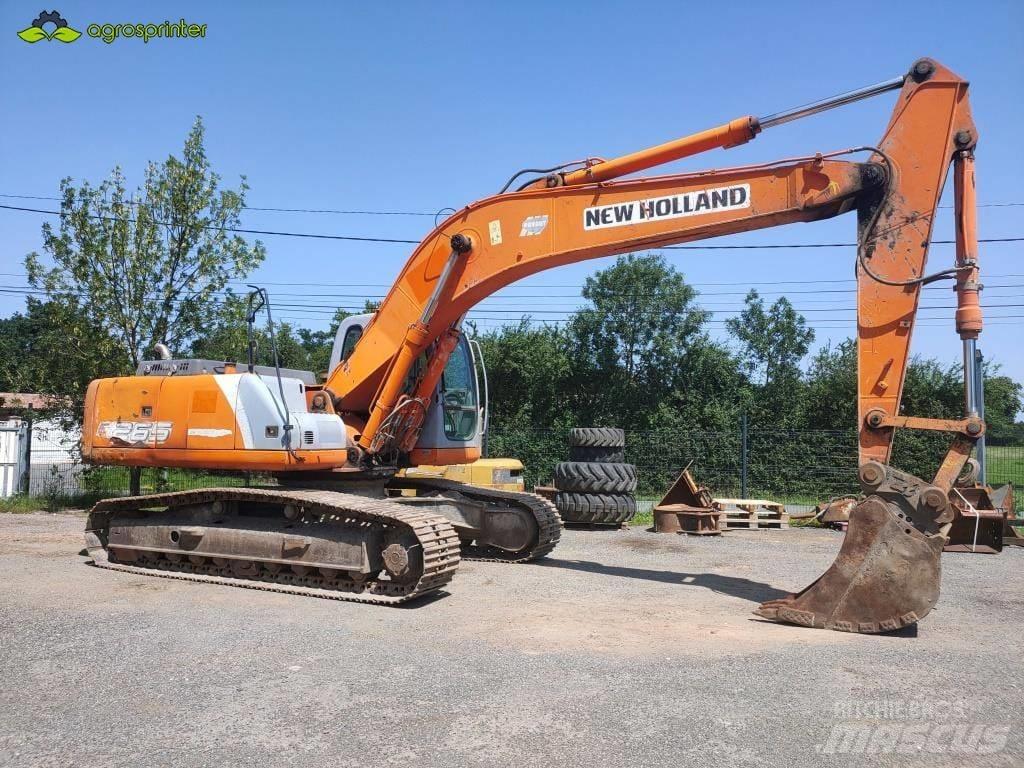 New Holland E 265 Rupsgraafmachines