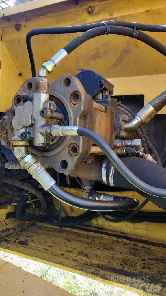 New Holland 335 Rupsgraafmachines