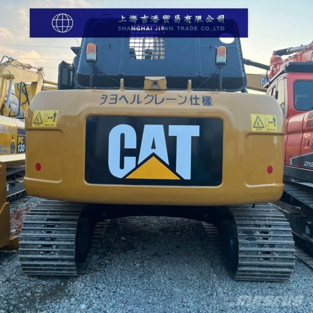 CAT 323 D Rupsgraafmachines