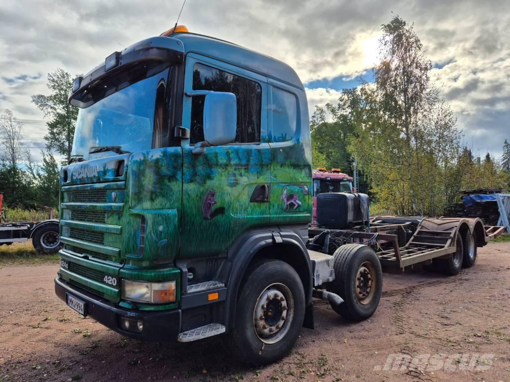 Scania R 124 Vrachtwagens voor bosbouwmachines