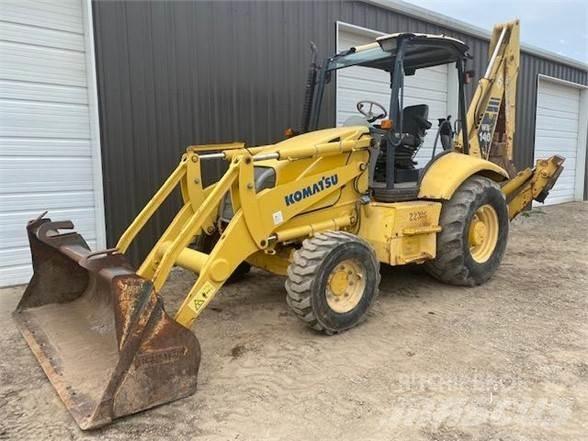 Komatsu WB140 Graaf-laadcombinaties