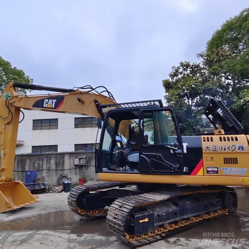 CAT 320 Rupsgraafmachines