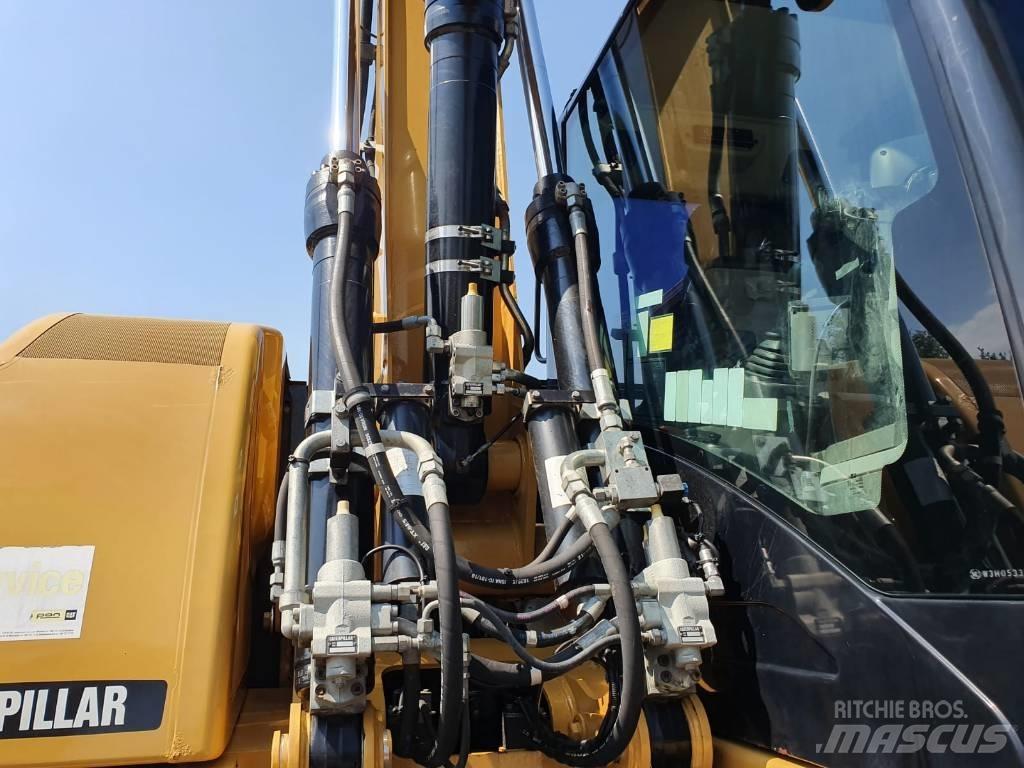 CAT M 313 D Wielgraafmachines