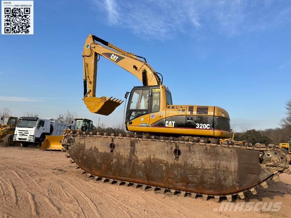 CAT 320 C L Amfibische graafmachines