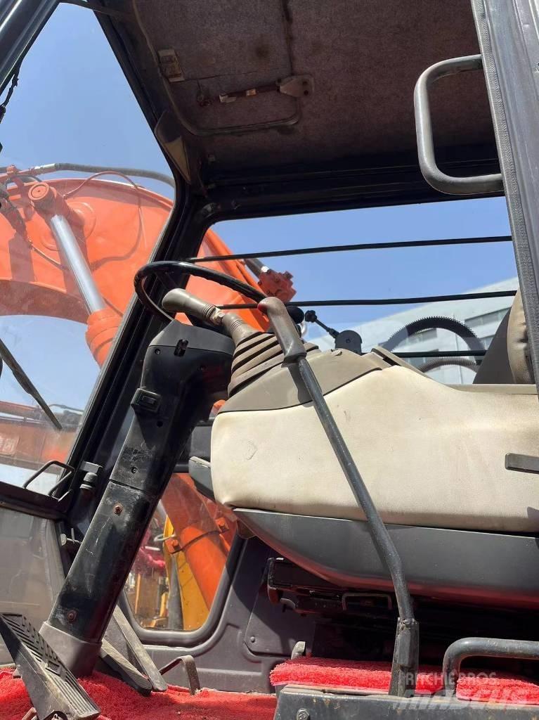 Hitachi EX 100 W D Wielgraafmachines