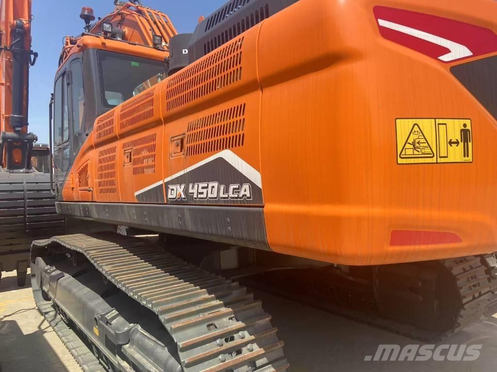 Develon DX 450 Rupsgraafmachines