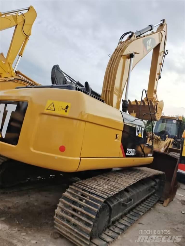 CAT 323 GC Rupsgraafmachines