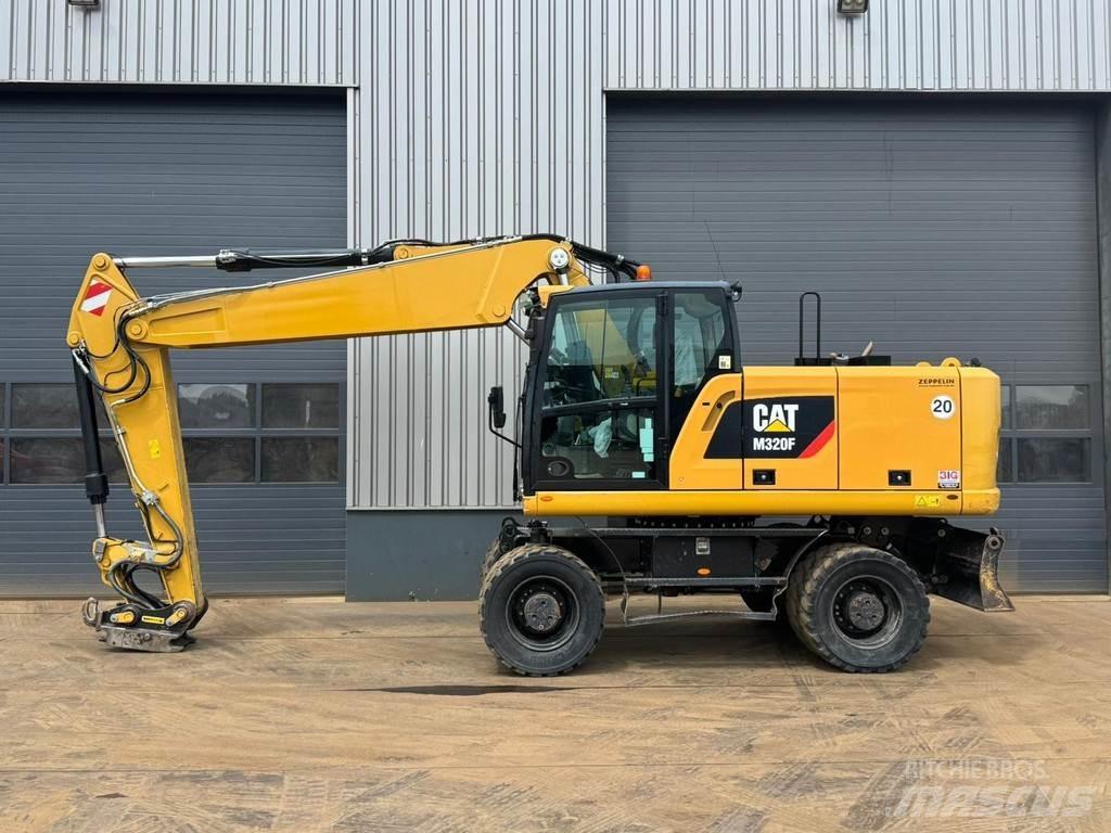 CAT M320F Wielgraafmachines