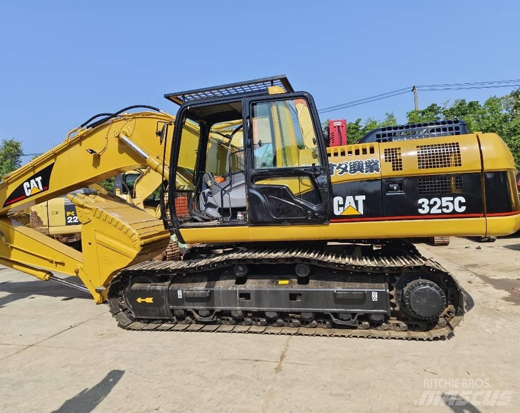 CAT 325 C Rupsgraafmachines
