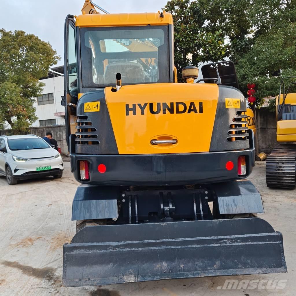 Hyundai 60 W VS Wielgraafmachines