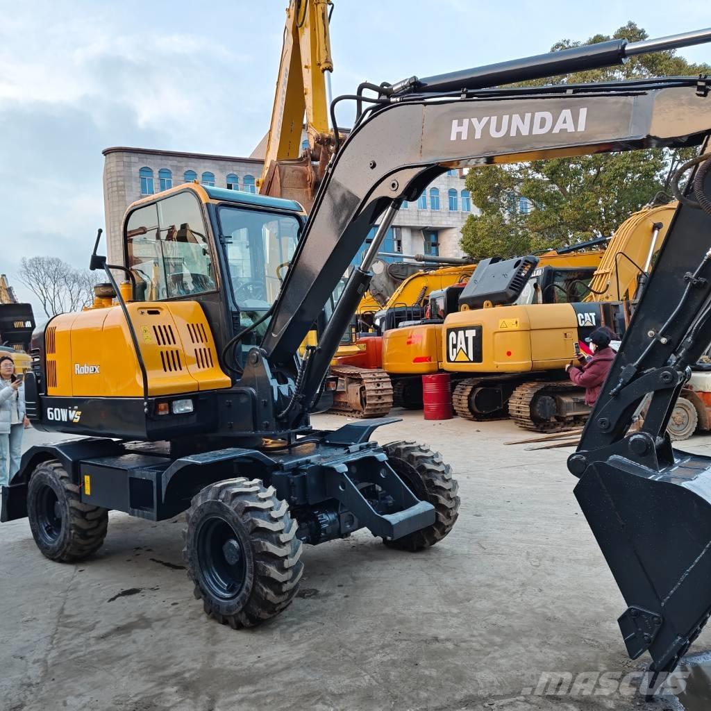 Hyundai 60 W VS Wielgraafmachines