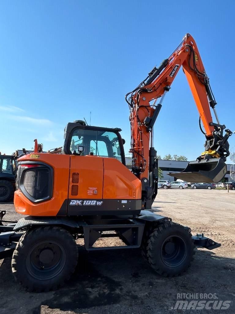 Develon DX 100 W-7 Wielgraafmachines