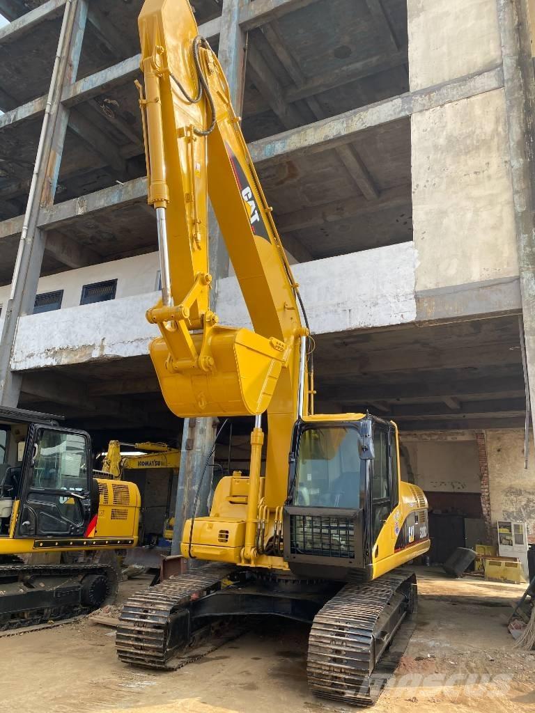 CAT 320 C Rupsgraafmachines