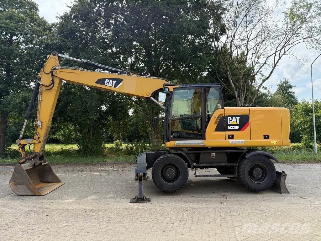 CAT M320F Wielgraafmachines