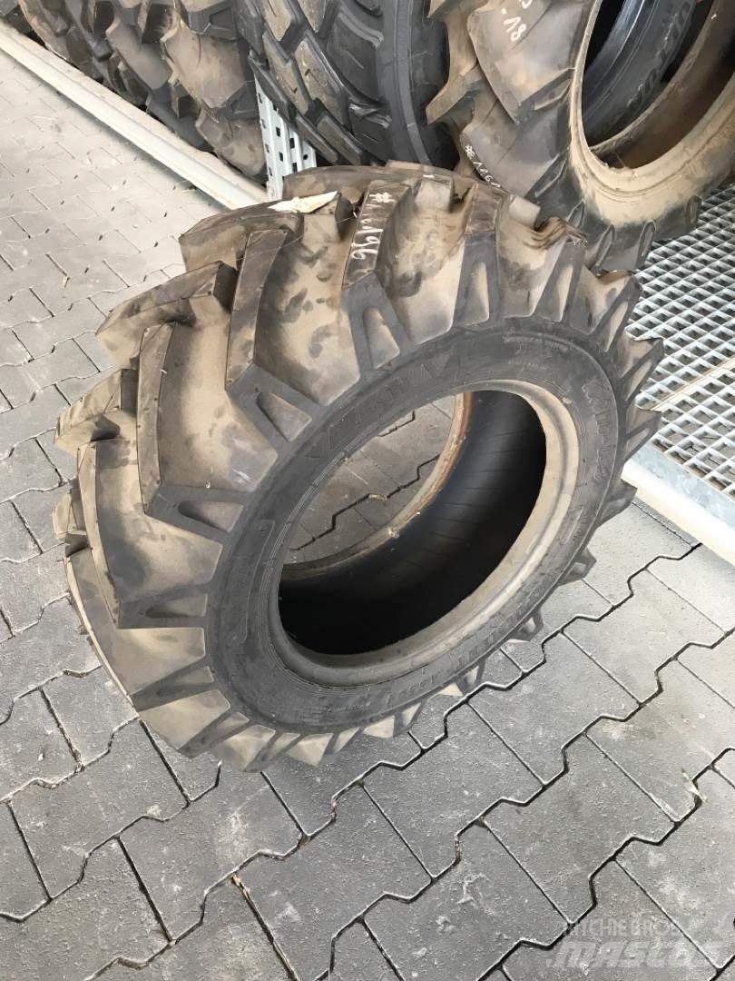BKT 10.0/75-15.3 Banden, wielen en velgen