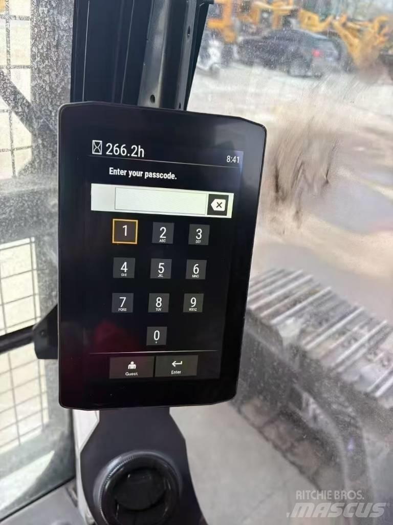 CAT 323GC Rupsgraafmachines