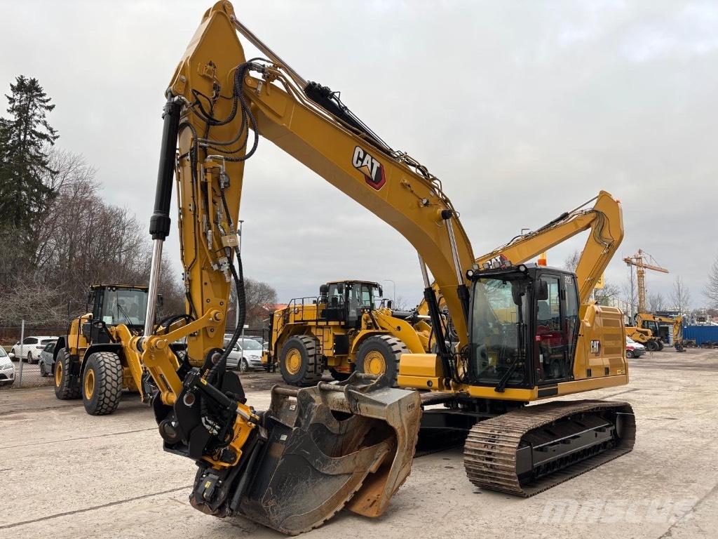 CAT 323 Rupsgraafmachines