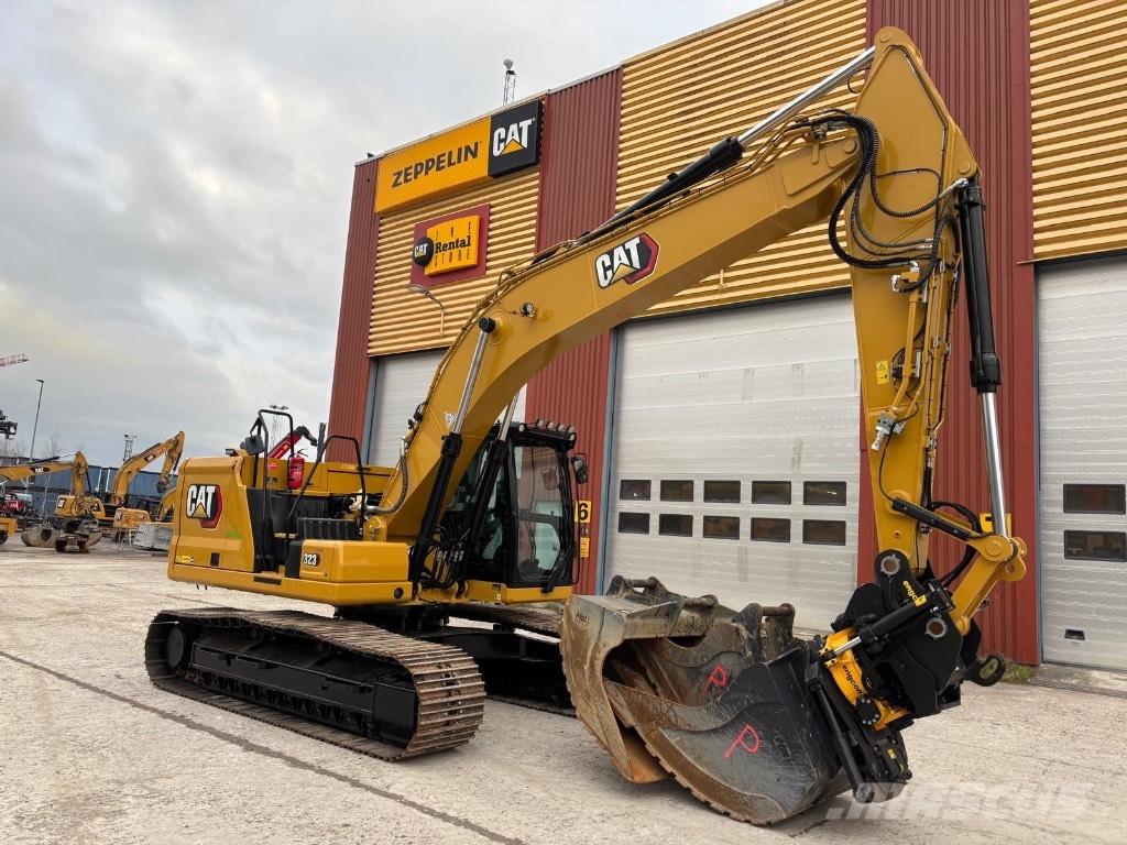 CAT 323 Rupsgraafmachines