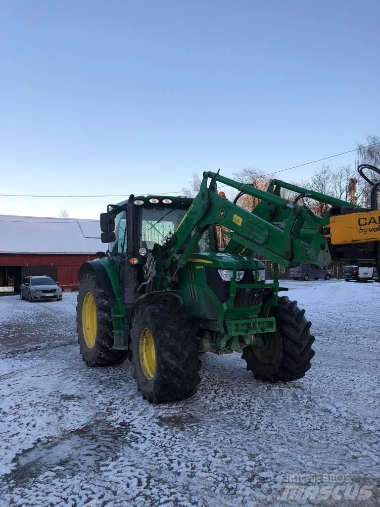 John Deere 6130 R Tractoren