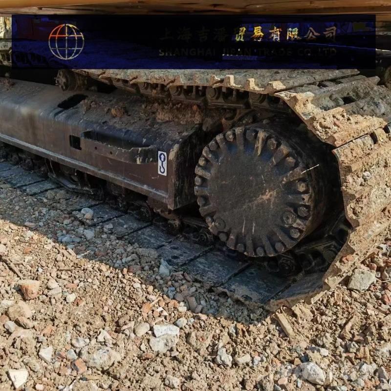 CAT 323 Rupsgraafmachines