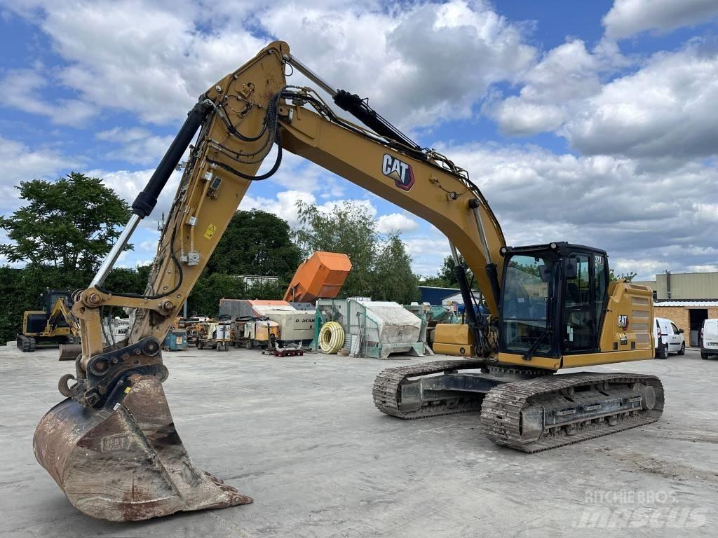 CAT 323 Rupsgraafmachines