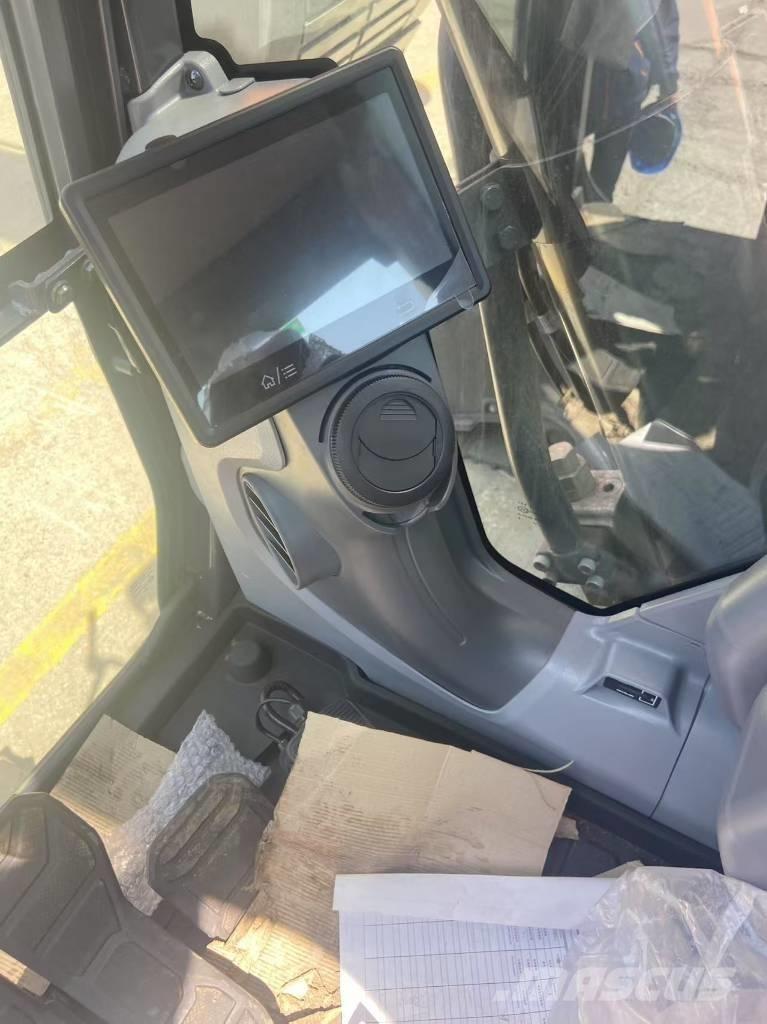 Develon DX 450 Rupsgraafmachines