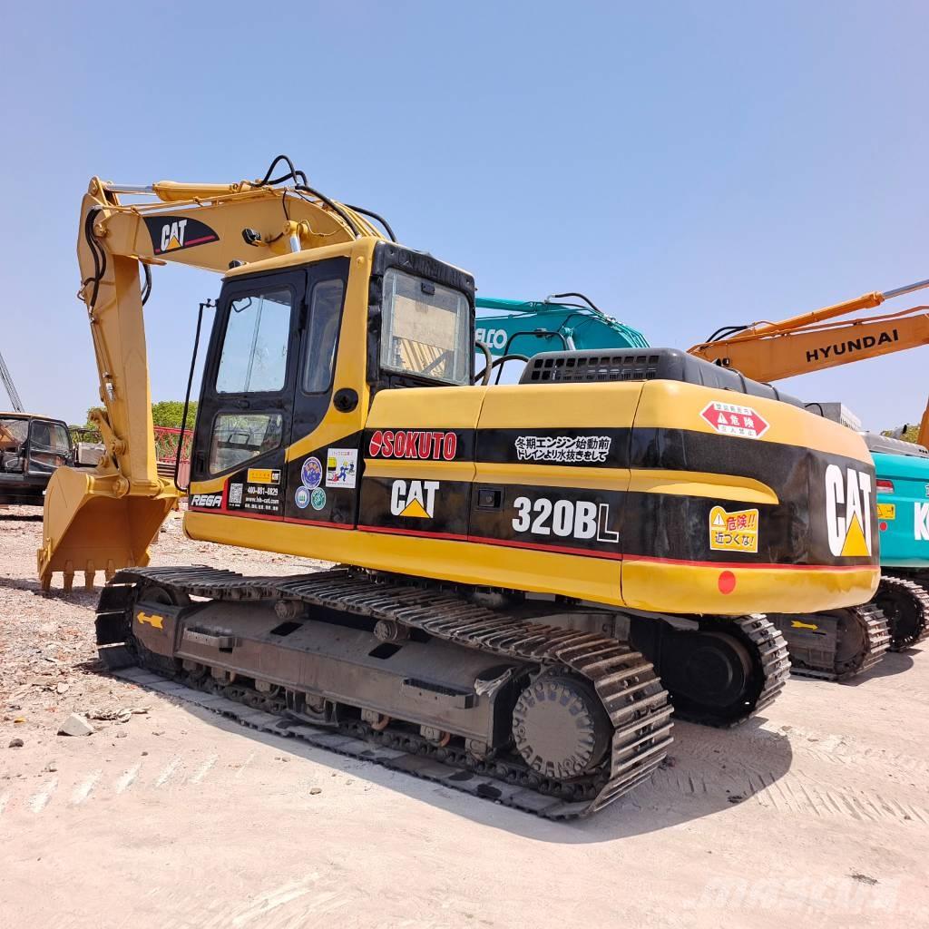 CAT 320 BL Rupsgraafmachines