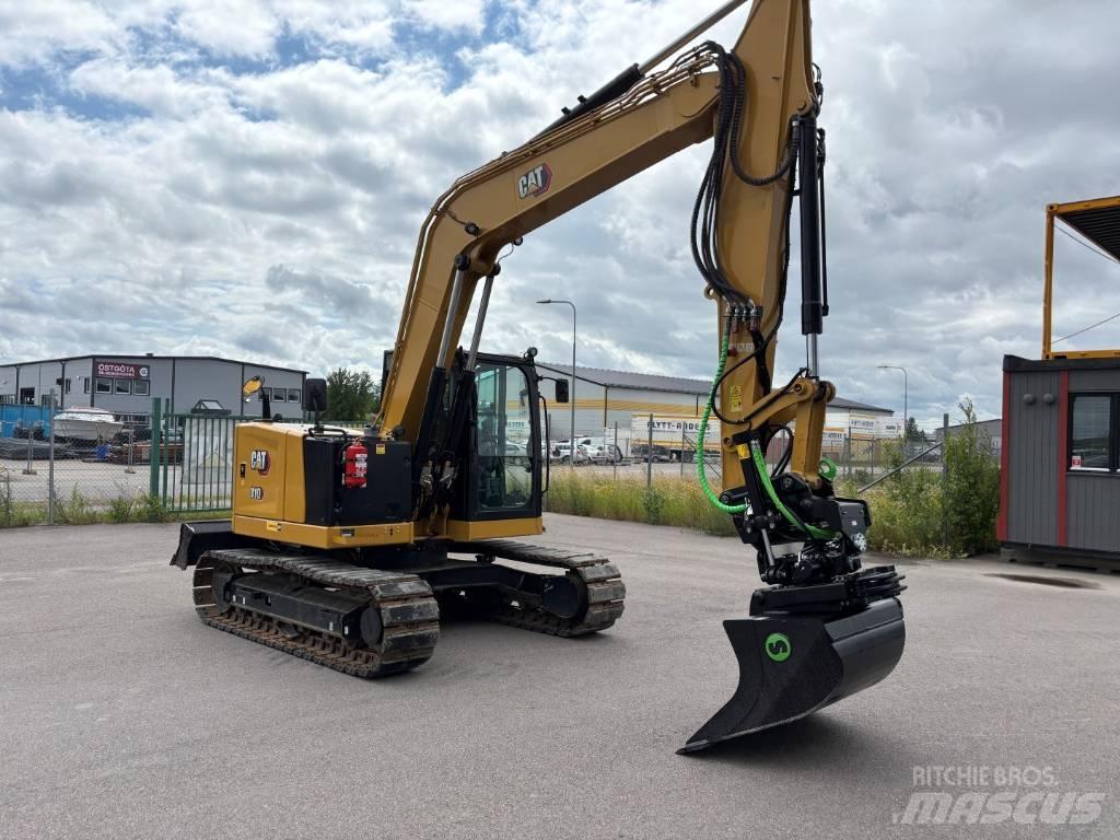 CAT 310 Rupsgraafmachines