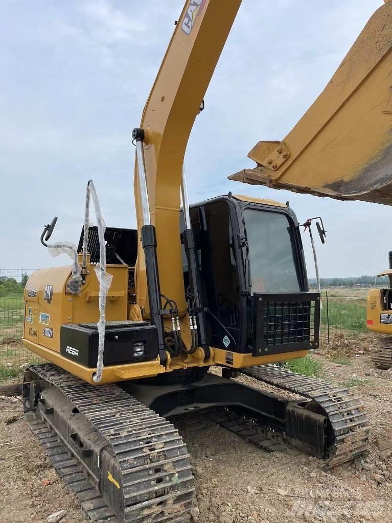 CAT 313 Rupsgraafmachines