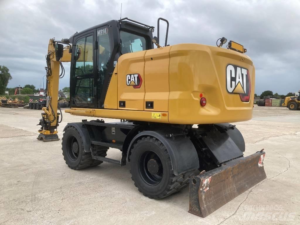 CAT M314 Wielgraafmachines