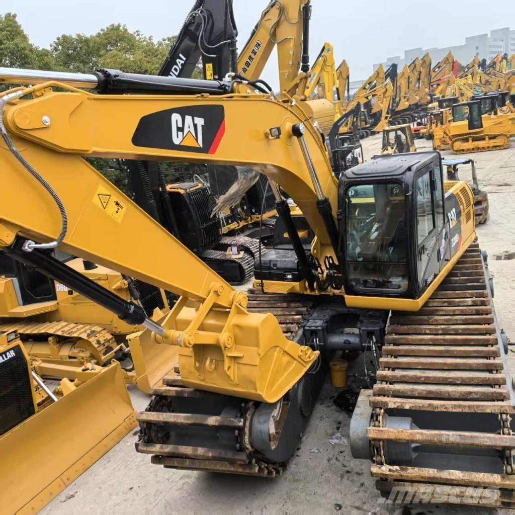 CAT 320 D Amfibische graafmachines