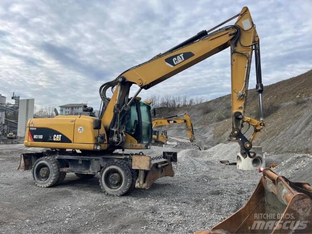 CAT M318D Wielgraafmachines
