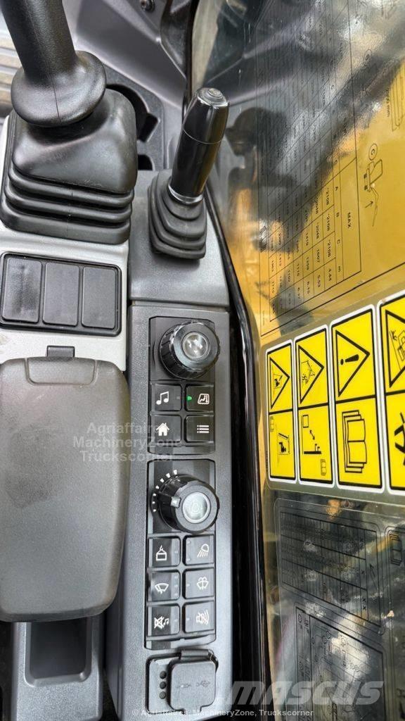 CAT 310 Rupsgraafmachines