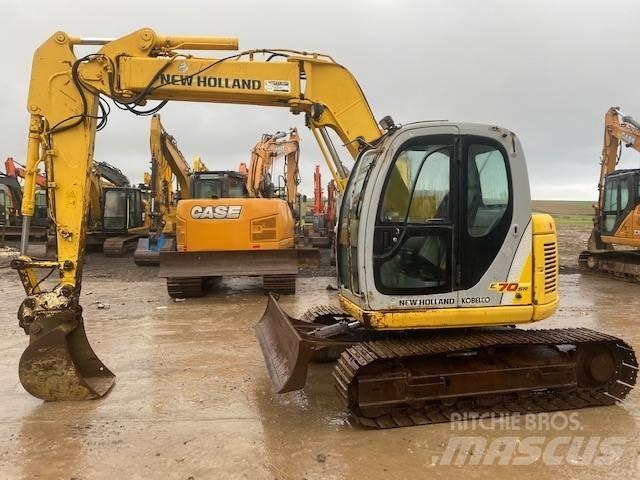 New Holland E 70 SR Midigraafmachines 7t - 12t