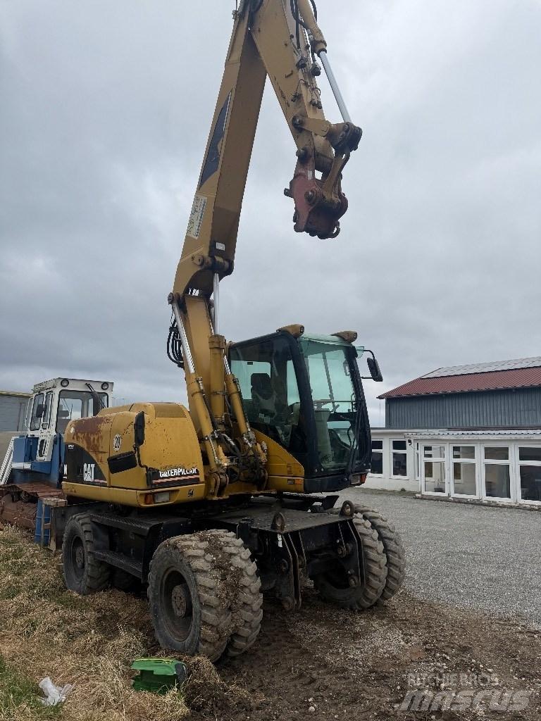 CAT M 313 C Wielgraafmachines